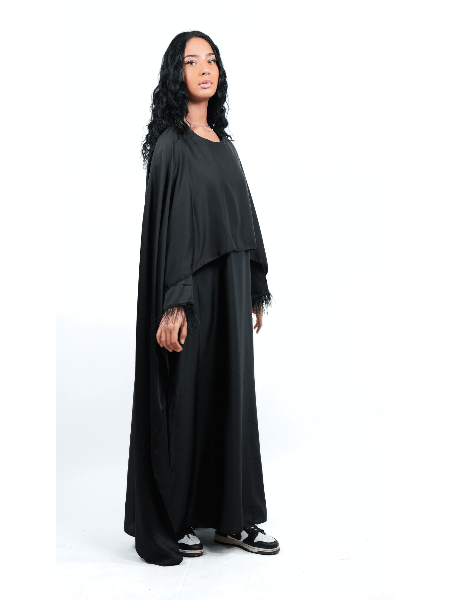 Robe cape et plume