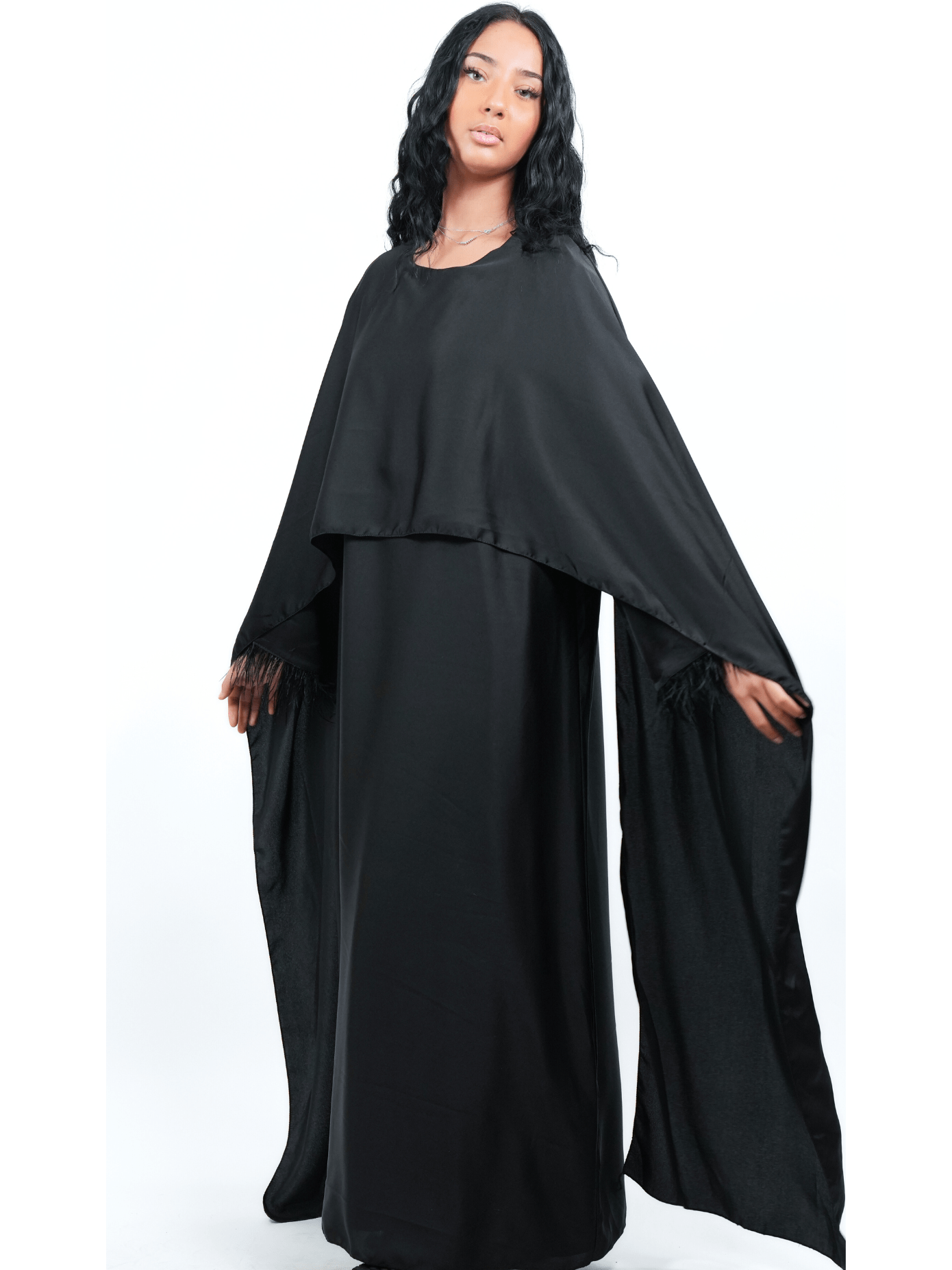 Robe cape et plume