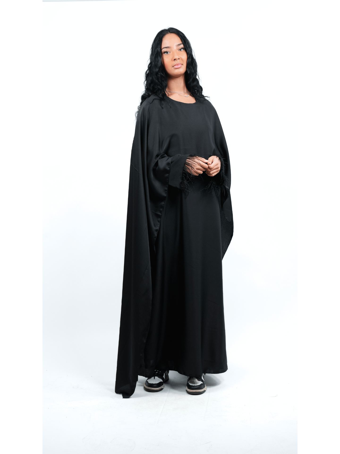 Robe cape et plume