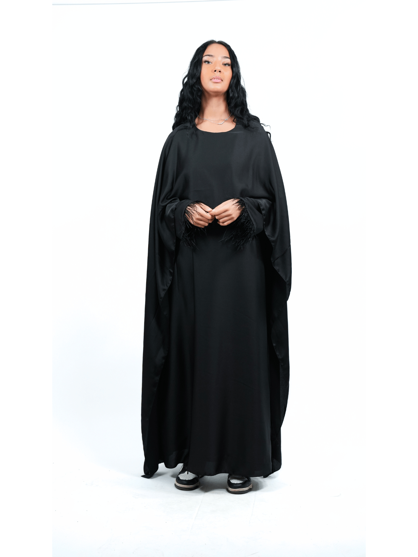 Robe cape et plume