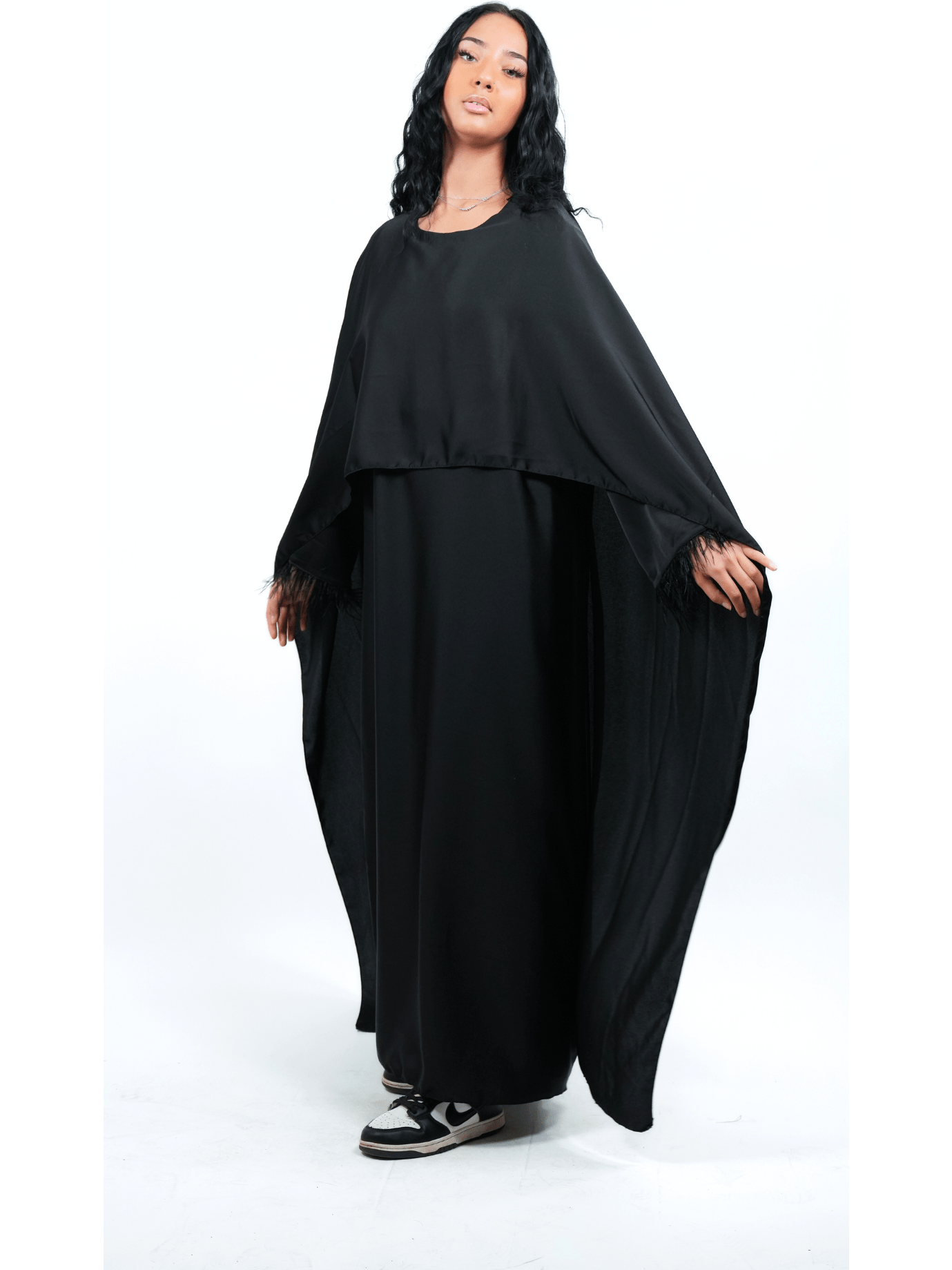 Robe cape et plume