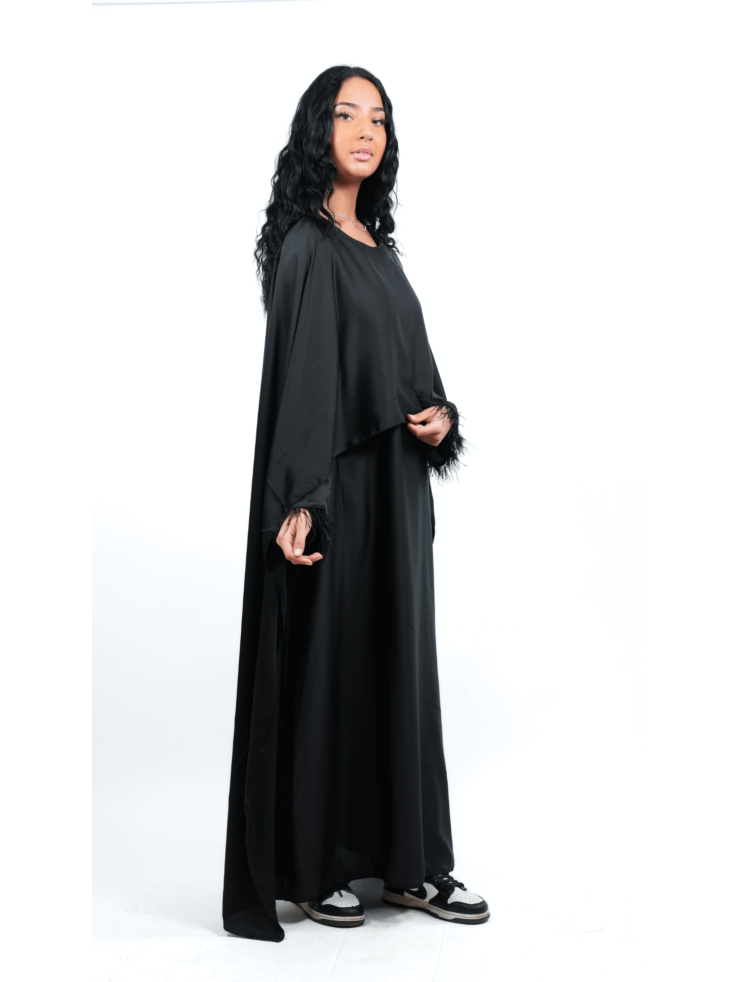 Robe cape et plume