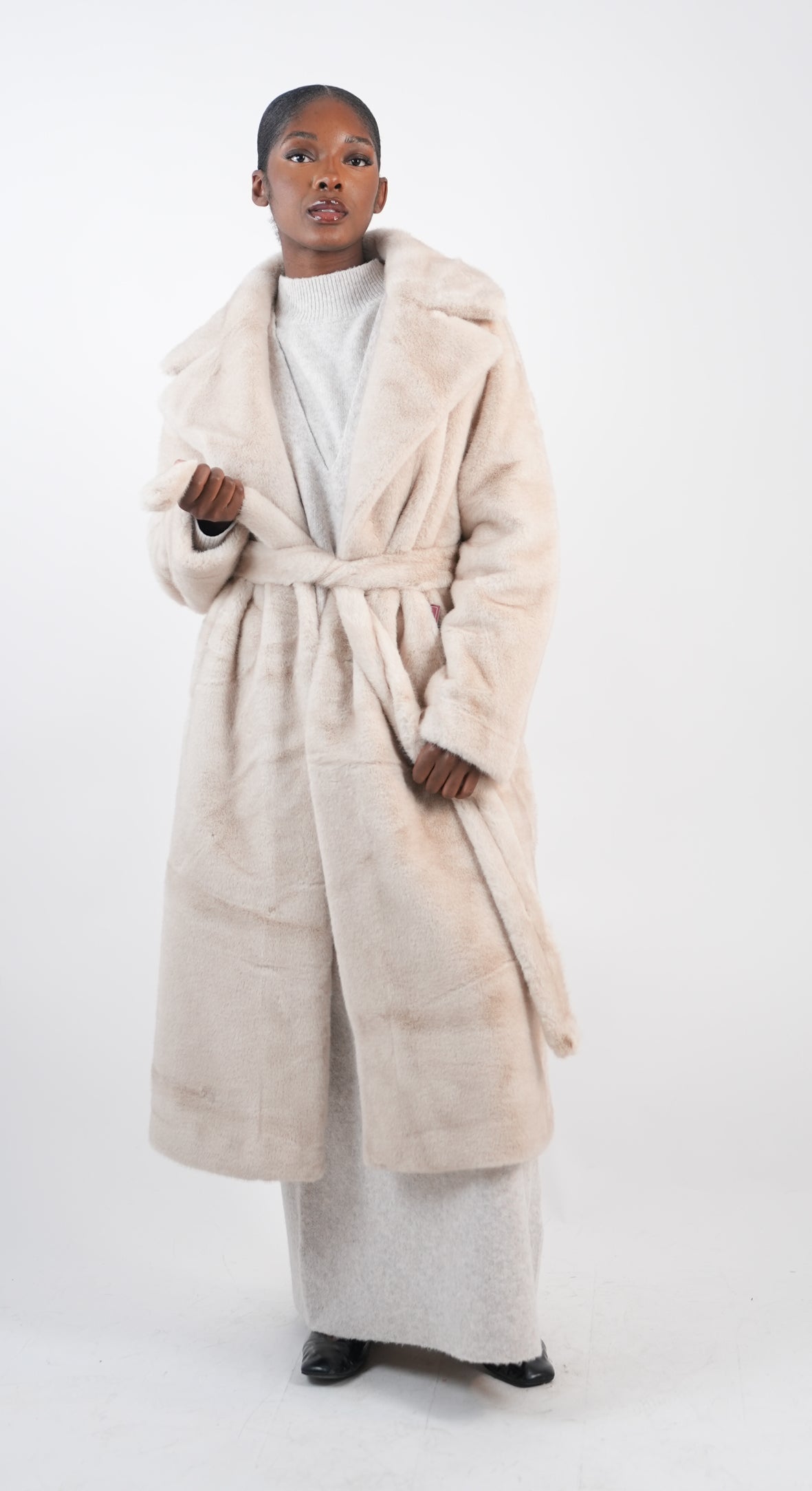 Manteau long fausse fourrure