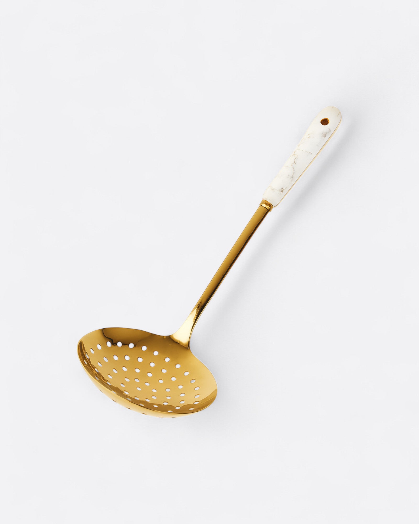 Écumoire marbré doré