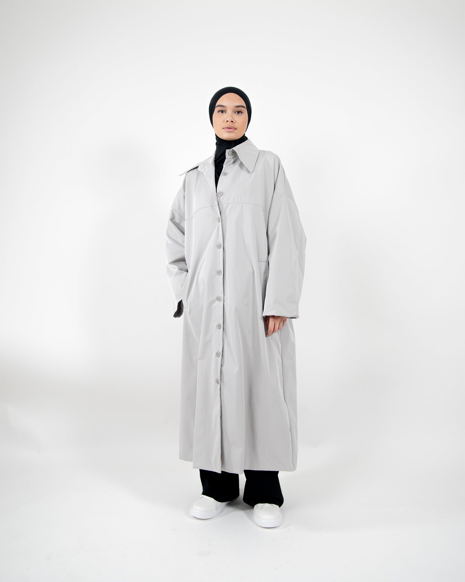 Parka larga, extragrande e impermeable con cierre de botones