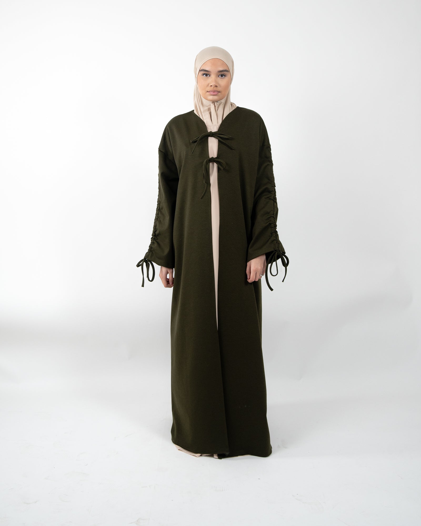 Gilet long et épais avec nœud de fermeture et manches à lacet