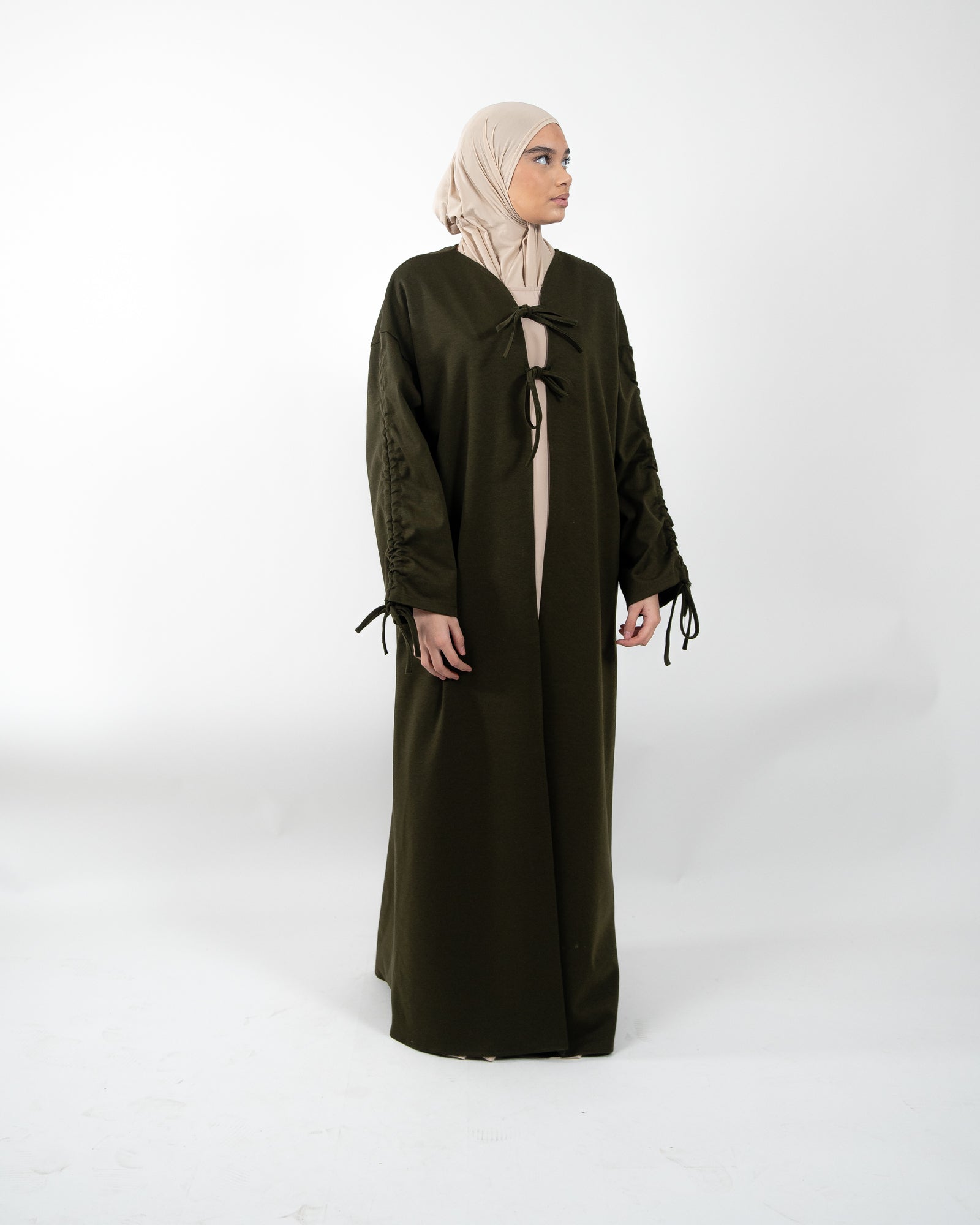 Gilet long et épais avec nœud de fermeture et manches à lacet