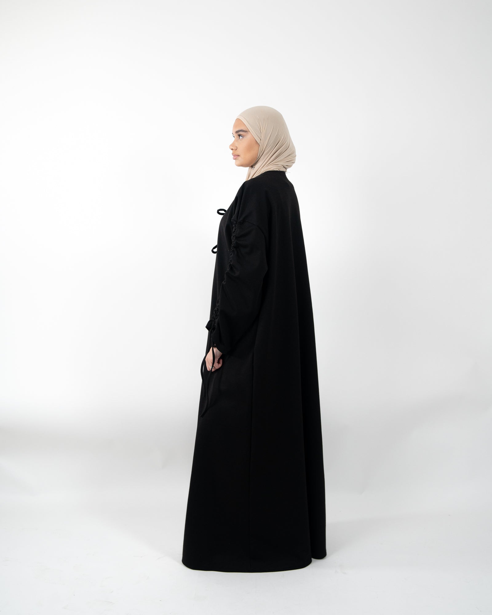 Gilet long et épais avec nœud de fermeture et manches à lacet