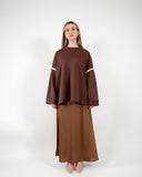 Pull oversize avec couture dorée sur les manches et col rond