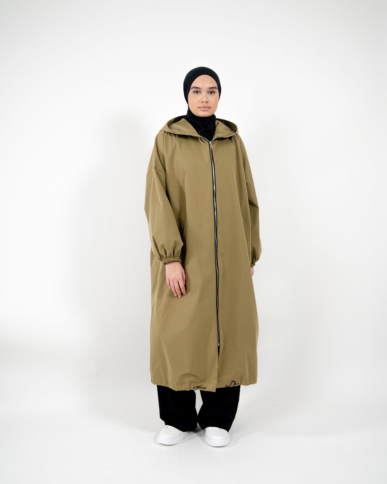Parka style imperméable long, oversize avec fermeture zip et capuche