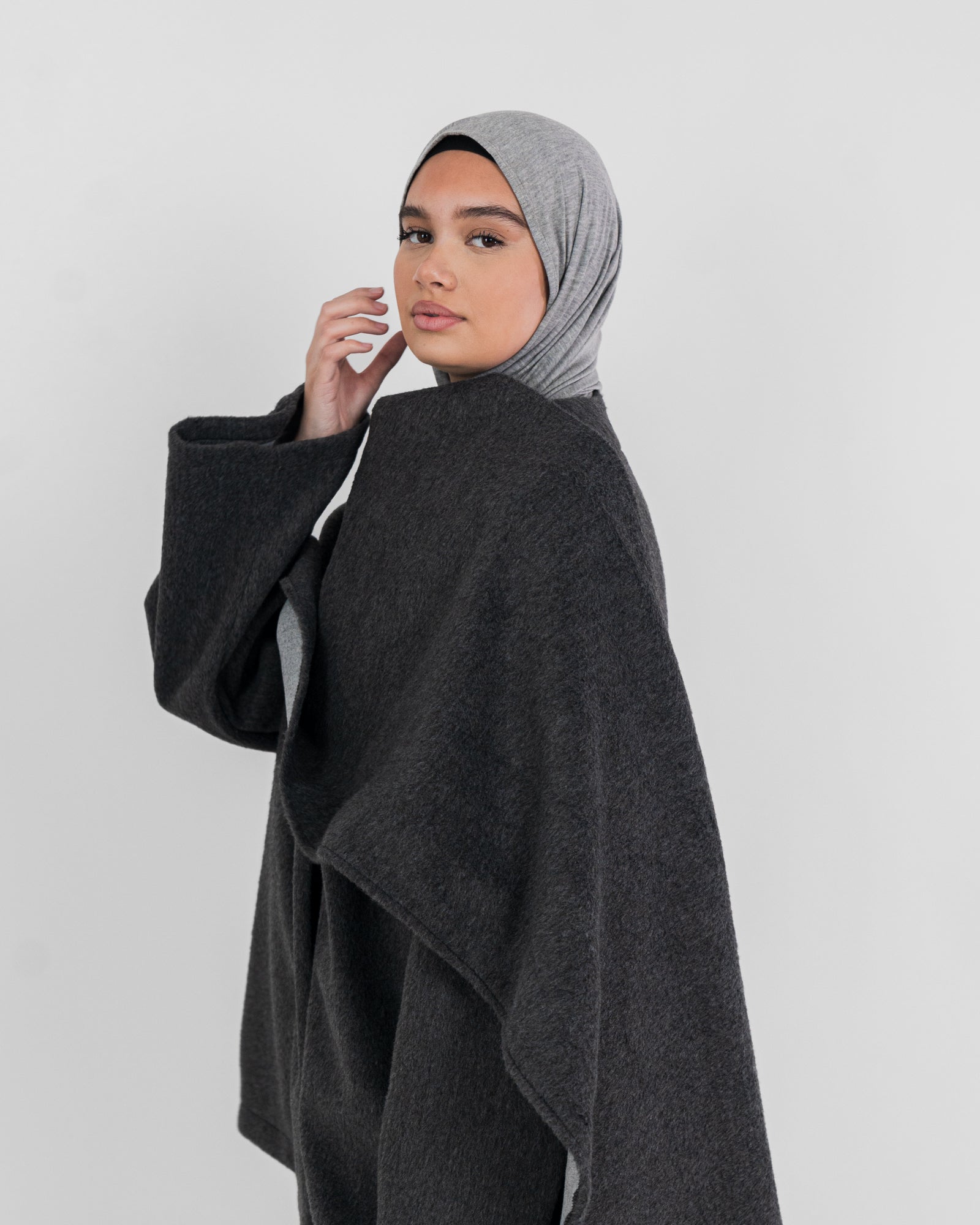 Manteau court avec cape