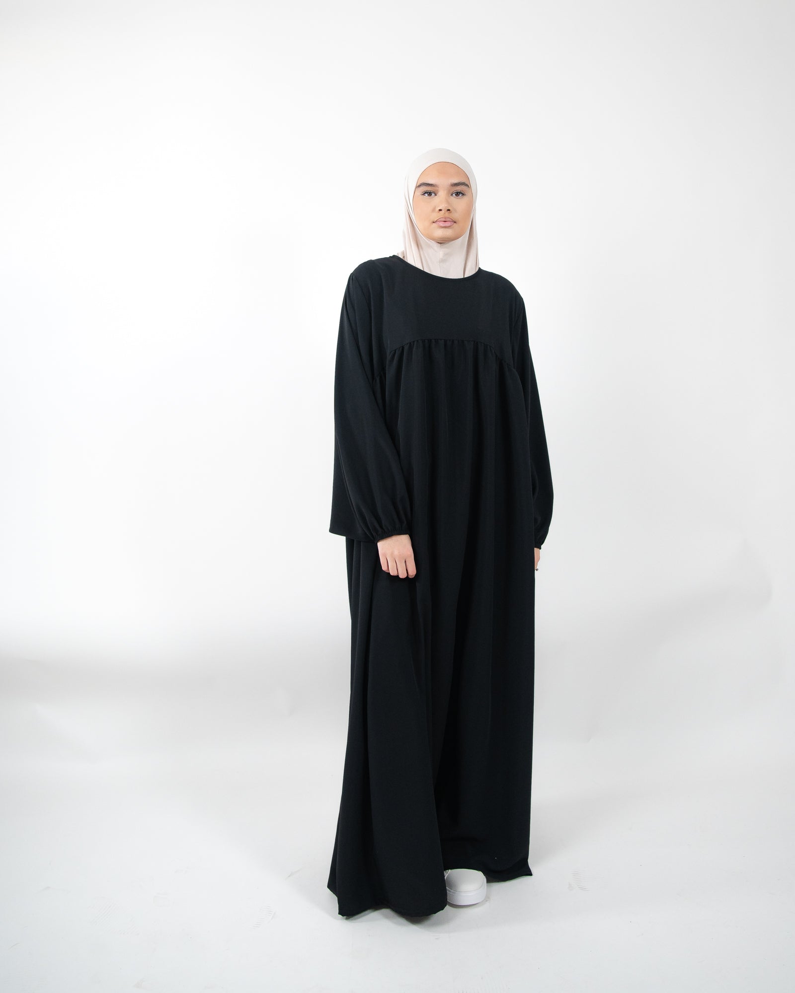 Robe longue et ample avec manches bouffantes