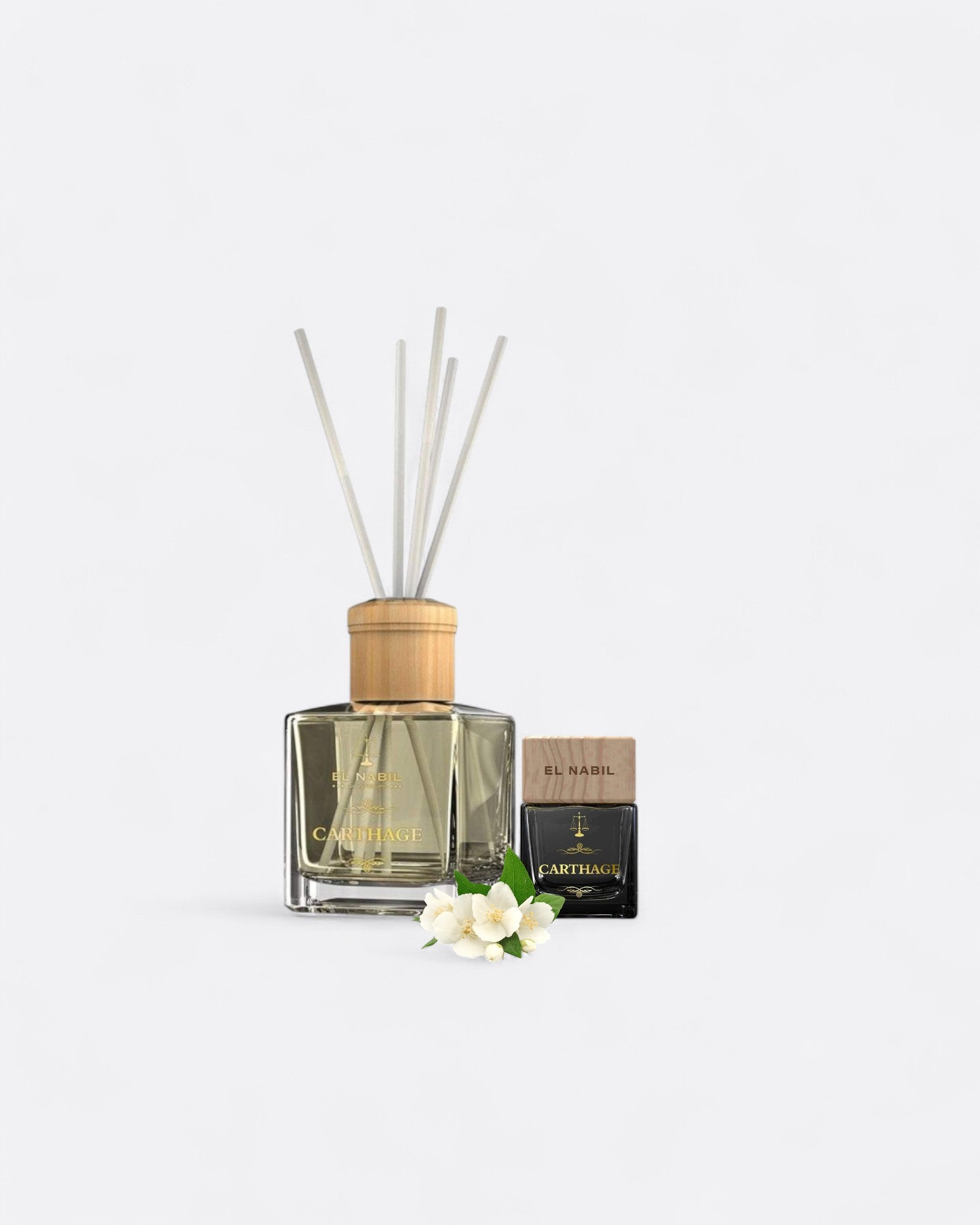 Pack Carthage El Nabil – diffuseur en roseaux 150 ml et dressing perfume 50 ml, fleurs blanches autour, ambiance florale jasmin.