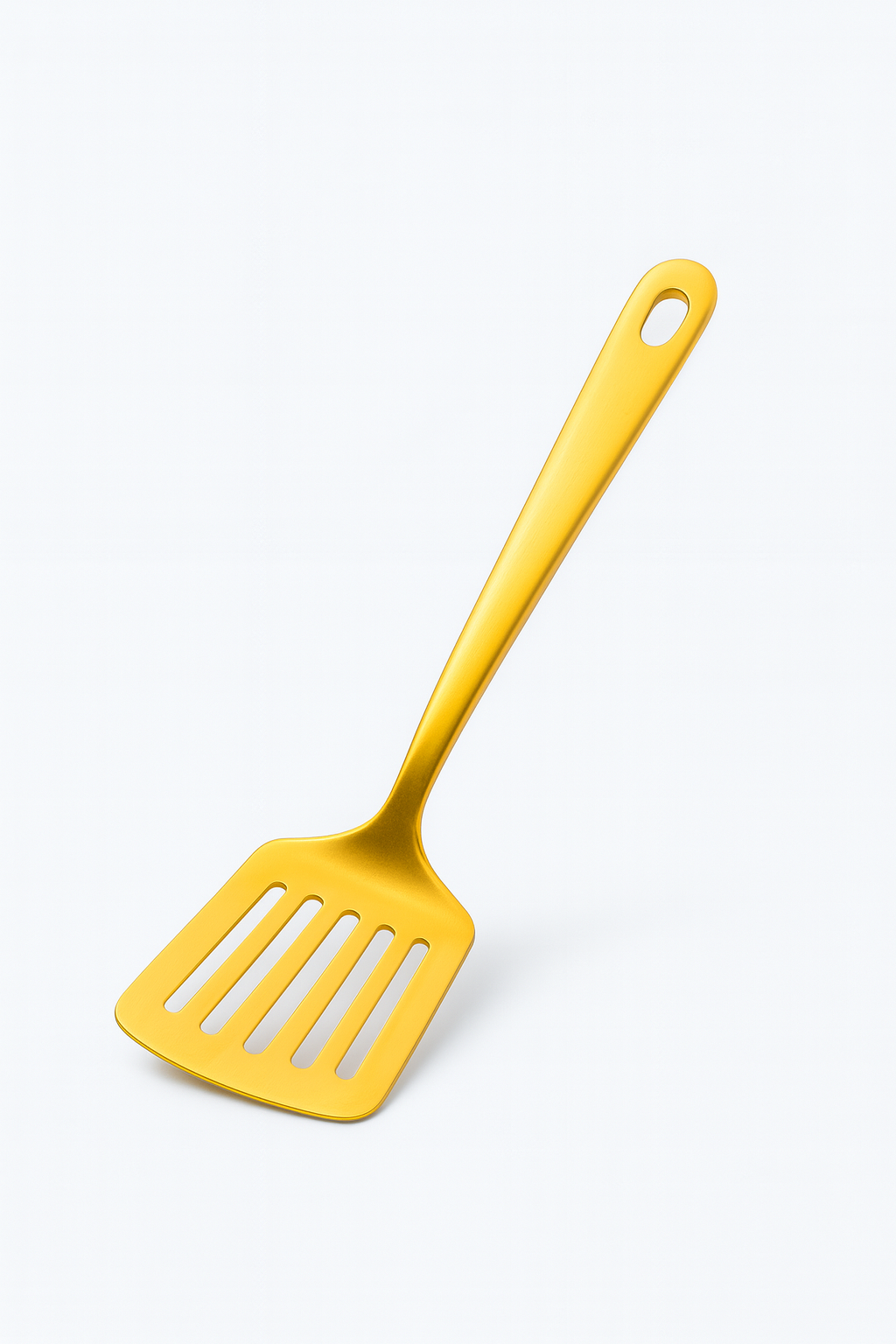 Petite spatule trouée en inox doré